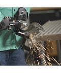 No Nonsense 4 1/2 Inch Air Angle Grinder Cranking 12000 RPM Tough Power in use, generating sparks while grinding metal.