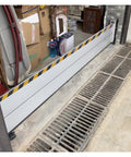 Heavy Duty Aluminum Flood Barriers For Front Doors And Driveways Tough As Nails Reusable Outdoor Weather Shield installed at entryway