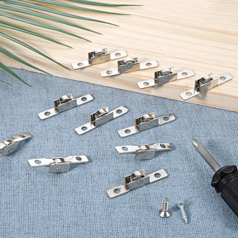 Pack Of 12 Push Pull Sliding Window Rollers Three Eighths Inch Metal Wheel With Axle For Sliding Doors And Windows displayed on fabric