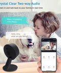 Child using Two Pack 1080p HD Indoor Security Cameras for Home Use with Motion and Sound Alerts, Night Vision, pet on phone screen