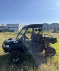 1000cc UTV Customizable Utility Vehicle for OEM and Commercial Projects, parked on grass with buildings in background