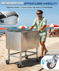 Ice Bin Cart With Wheels For Outdoor Parties And Patio Events A Portable Insulated Cooler Cart with sliding lid on a beach boardwalk
