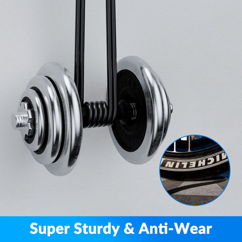 Close-up of sturdy, anti-wear pulley system with chrome weights and black rubber. Inset shows high-quality tire tread detail.