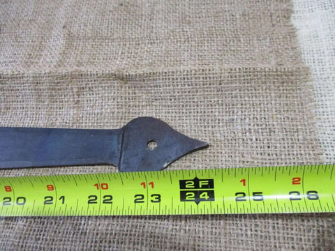 Close-up of Two Huge Strap T Hinges 24 Inch Hand Forged Gate Hardware Barn Rustic Medieval Iron Set Of 2 with measuring tape