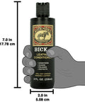 Top Tier Non Darkening Leather Conditioner And Cleaner For Kicks Couch Car Rigs Heavy Duty Polishing Solution in 8 Oz Bottle, held in hand.