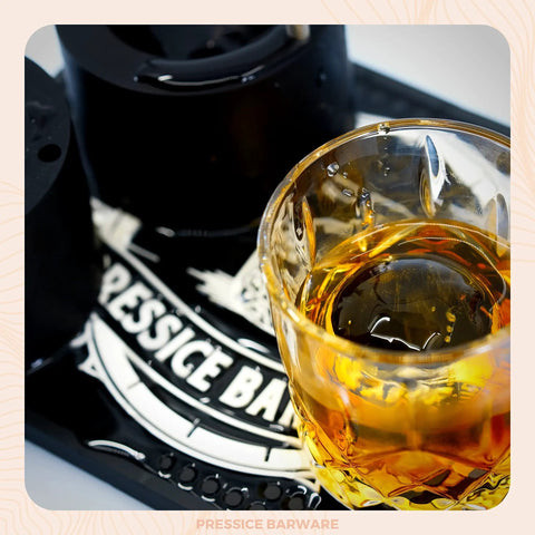 Ice Press Kit For Craft Cocktails To Level Up Your Home Bar With 2.3 Inch Sphere Ice Maker, Aircraft Grade Aluminum Press in use with drink