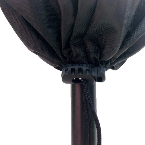 Close-up of Black Tiki Torch Cover Set Of Two For Outdoor Use Weatherproof Protective Covers With Locking Drawstring Bottom For A Secure Fit