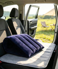 Premium Inflatable Wedge Pillow For Rivian R1S And R2 Smooth Ride Overland Travel Gear on car seat with gray cushion.