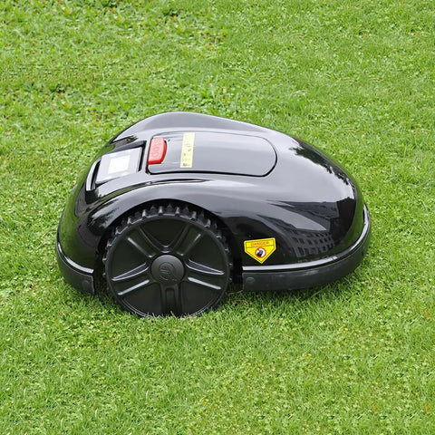 Smart Automatic Robotic Lawn Mower With Self Charging And Rain Avoidance on grass, black exterior, side view