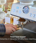 Talos Semi Automatic Grind And Brew Espresso Machine With Built In Conical Burr Grinder 20 Bar Italian Pump Real Time Pressure Gauge Stainless Steel Lunar Finish showing twist-lock hopper