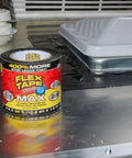 Roll of heavy duty rubberized waterproof tape for patching leaks on metal surface, 4 in by 25 ft, Flex Tape shown prominently
