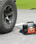 Beefed Up Dual Cylinder Tire Inflator With Heavy Duty Air Compressor 150 PSI 10.6 CFM inflating truck tire