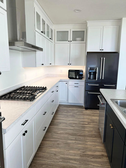 Modern kitchen with cabinetry featuring Door And Drawer Pulls 6-Inch Center-To-Center Brushed Titanium Gold Finish 10 Pack For Cabinets And Furniture Upgrades Ideal For Kitchens And Bathrooms Includes Ten Pulls For Easy Replacement And Coordinating Hardware With Matching Lexington Knobs.