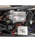 Automotive ECU module with silver metal housing and multi-color wiring harness