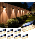 Kick It Up A Notch With This 8 Pack Of Solar Fence Lights Delivering A Cozy Warm White Glow mounted on a wooden fence.