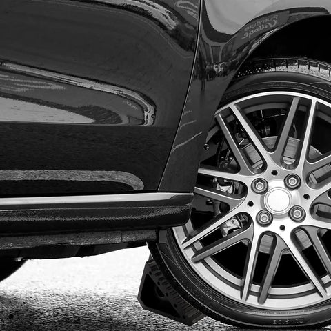 Heavy Duty Rubber Wheel Chocks 2 Pack With Ergonomic Carry Handles Weather Resistant And Durable Stabilizers under car tire