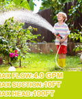 Child watering garden plants with a hose, demonstrating 110V AC Self Priming Diaphragm Water Pump 4.0 GPM 50 PSI features.