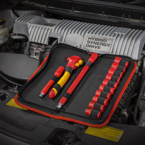Straight Up Tough 13 Piece VDE Insulated Tool Set With Slick Ergonomic Ratchet Sockets And Extensions in a case on an engine.