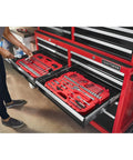 Kickin 135 Piece Mechanic Tool Set With Low Profile Ratchet And Hella Smooth 72 Tooth Swing in a garage tool cabinet.