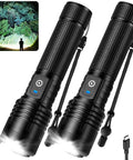 Dual pack of Rechargeable LED Flashlight Beast Bright 100,000 Lumens Tactical Torch with 5 Modes and USB cables, lit up in the dark.