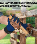 Leather Heavy Duty Work Gloves For Mechanics And DIY Pros With Impact Resistance Anti Vibration And Water Repellent Coating Ideal For Auto Tools Construction Warehousing Gardening And More Size Large Blue being used with a hammer on a fence.