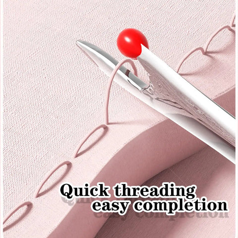 Close-up of 2 In 1 Automatic Needle Threader And Seam Ripper For Quick Sewing And Quilting Projects showing needle threading on fabric