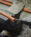 Using Aluminum Oxide Grinding Stone For Rotary Tools 2 Count Pack Heavy Duty Pro Grade Bit on copper pipe in vise