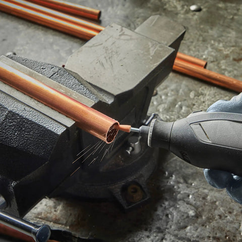 Using Aluminum Oxide Grinding Stone For Rotary Tools 2 Count Pack Heavy Duty Pro Grade Bit on copper pipe in vise