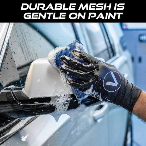 Person using Mesh Bug Scrub Sponge For Cars 4x6 Inch, Tar And Bug Remover, Microfiber Mesh With Foam Core on car side mirror