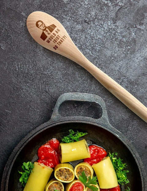 2 Piece Funny Wooden Spoons For Cooking The Office TV Show Gift engraved spoon on dark kitchen surface with food