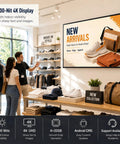 Heavy Duty 65 Inch Wall Mounted Digital Signage Display 4K Menu Board Indoor Commercial Business Advertising Screen in a retail setting.