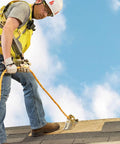 Worker on rooftop using 50 Ft Vertical Lifeline Assembly With Adjustable Rope Grab And Shock Absorber, OSHA Compliant Fall Protection System