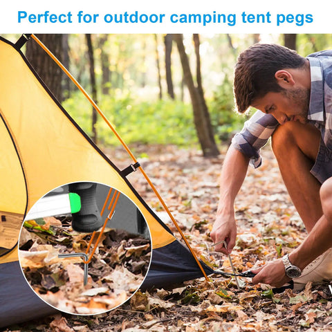 Man securing a tent with Beefy Heavy Duty Metal Tent Stakes Set 17 Pack for Outdoor Decorations on forest ground.