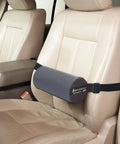 The Original McKenzie Lumbar Roll Standard Density Low Back Support Pillow secured on car seat for ergonomic support.