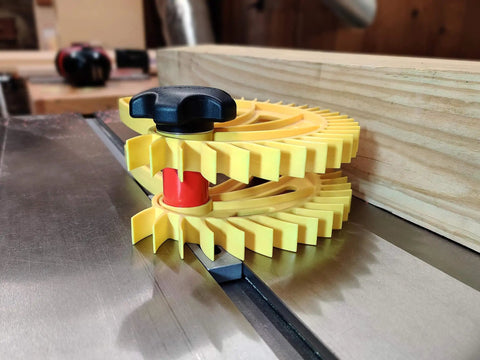 Heavy Duty Featherboard Stacking Spacer For Table Saw Resaw Setup, featuring yellow design and secure adjustment knob on a metal surface.