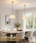 AyshwillDec 10" Modern Gold Linen Pendant Light Dining Room Bulb Included over a dining table with a modern design.