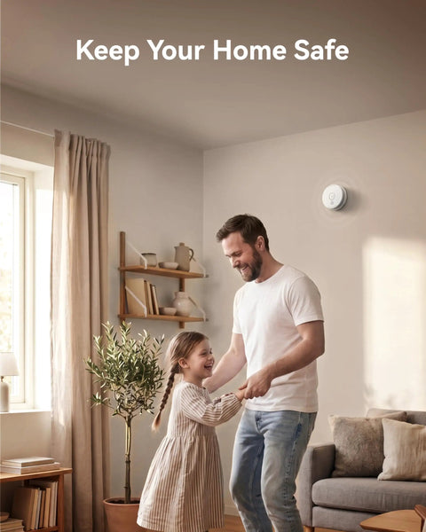 9V Battery Powered Photoelectric Smoke Alarm With Low Battery Alert No Fuss Install UL217 10th Edition Listed GS509A White Smoke Detector For Home Safety And Early Smoldering Fire Detection mounted on wall in living room