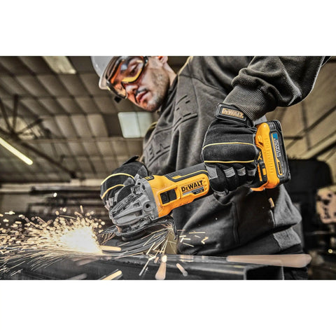 Worker using Powerhouse 20V Max XR Cordless Angle Grinder With Kickback Brake and Slide Switch, 4-1/2 Inch Disc, Tool Only, Model DCG405B