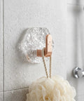 Water Ripple Hexagonal Adhesive Wall Hooks, Super Grippy No Drill Bathroom And Kitchen Organization System For Hanging Towels Keys Or Cozy Decor, Zero Mess Waterproof Setup You Will Honestly Love, hexagonal hook holding a shower pouf.