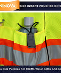 Close-up of ANSI class 2 surveyor safety vest with reflective strips, side pocket holding water bottle, detail view