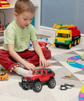 Child playing with red RC car, 4.8V USB RC Car Charger with Indicator Light shown on floor, colorful toys around.