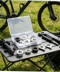 Beefed Up Heavy Duty Bicycle Wheel Axle Nut Kit With Carbon Steel Nuts And Anti Rotation Tab Washers For Mountain And Road Bikes Secure Retention Hardware To Prevent Loosening During Rough Rides. Wheel axle nut kit in case with carbon steel nuts and tab washers on a table.