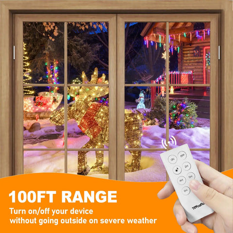 Weatherproof Outdoor Light Timer With 100 Ft Remote And Auto Dusk To Dawn Sensor built tough shown by window with illuminated reindeer.