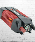 Heavy Duty 900W Peak Power Inverter Converts Dc 12V To Ac 110V with dual plugs, USB port, and cooling fan.