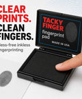Top Shelf Premium Inkless Fingerprint Tacky Sheets For Notary And Legal Forms Black 4 Pack with open pad and finger pressing.
