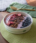 Compostable 32oz GreenStripe PLA Lined Squat Paper Bowls Case Of 300 Eco Friendly Bulk Takeout Ready White Round With Lids Optional ASTM Compliant BPI Certified with lid filled with fruit and nuts