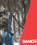 Hunter holding Swarm Fusion 10X GEN3i Break Barrel Pellet Air Rifle With 10 Shot Inertia Fed Magazine, 3-9x40 Scope in forest