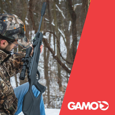 Hunter holding Swarm Fusion 10X GEN3i Break Barrel Pellet Air Rifle With 10 Shot Inertia Fed Magazine, 3-9x40 Scope in forest