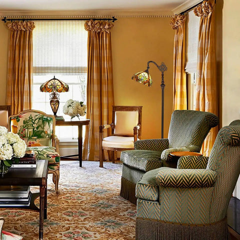 Living room with Tiffany Style Stained Glass Reading Floor Lamp With Antique Arched Tall Design 62 Inch Standing Lamp For Living Room Bedroom Or Office Handcrafted Glass Shade Warm Ambient Light And Vintage Vibe beside armchair.