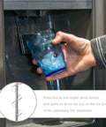 Refrigerator Dispenser Auger WR17X11939 Replacement Part dispensing ice into a glass from a refrigerator ice maker.